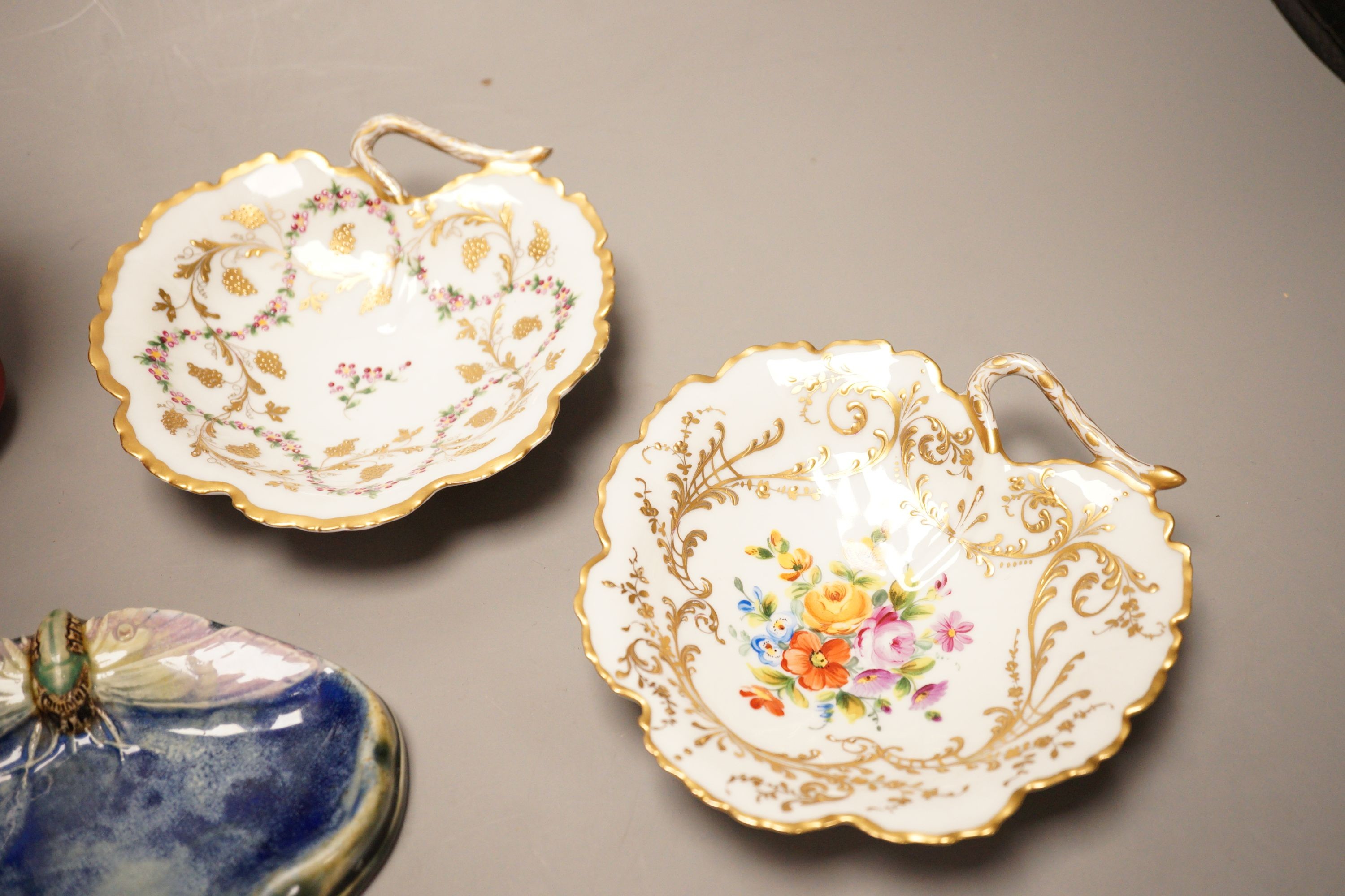 A Poole Delphis cat, a Doulton Lambeth soap dish and two Limoges dishes, tallest 29cm